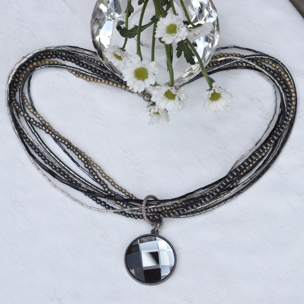 MULTI-STRAND BEADED NECKLACE